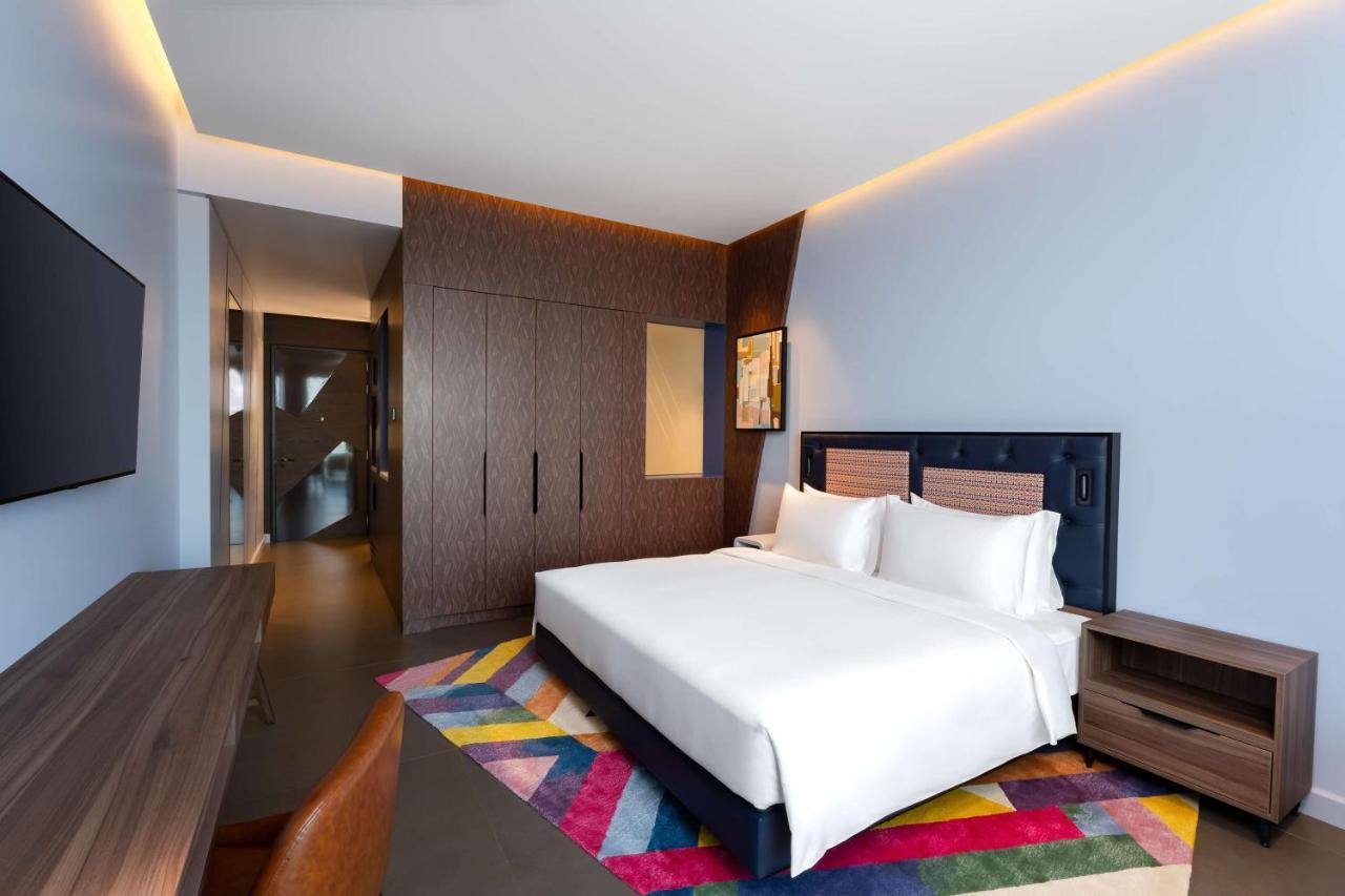Hyatt Centric Jumeirah Dubai Exterior photo A bedroom at the hotel